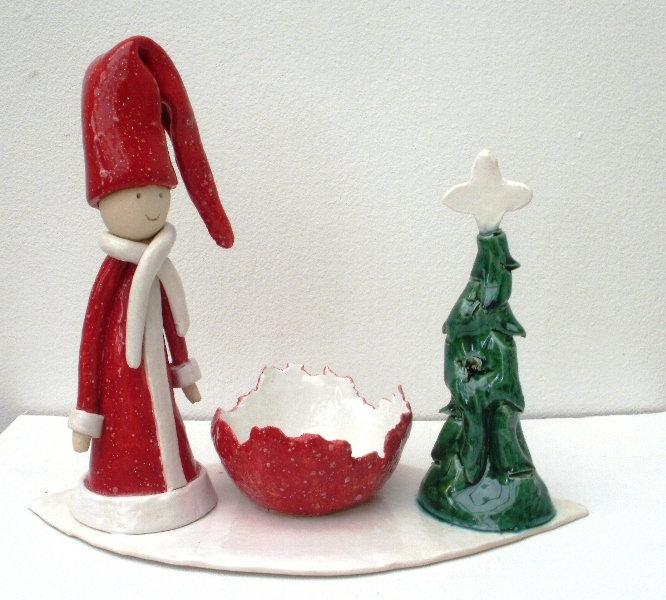 nissepige ved juletræ