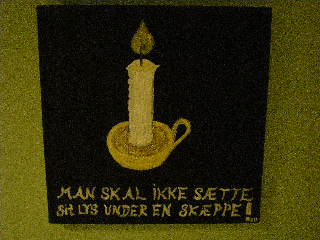 A candle in a candlestick