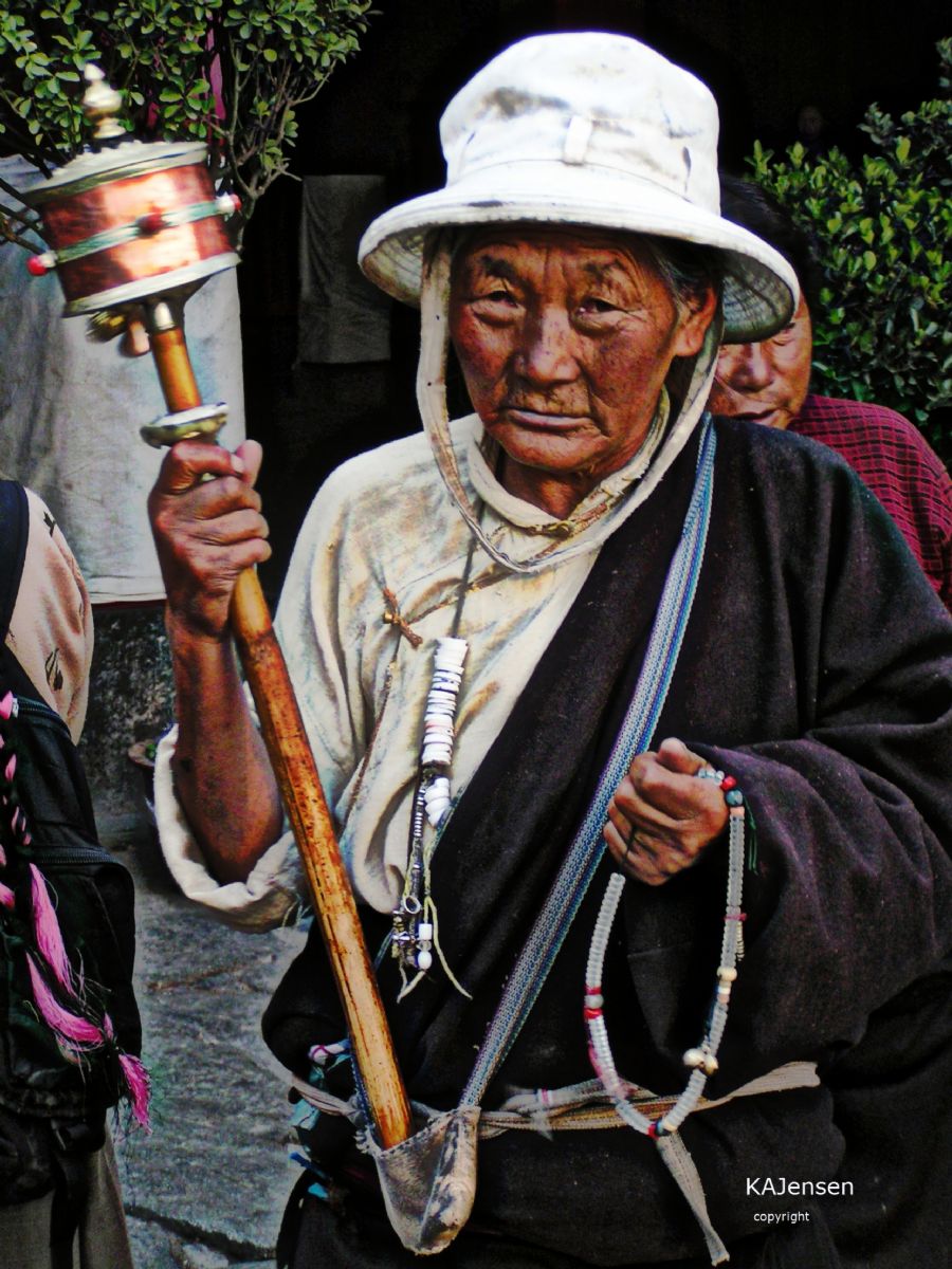 Tibetan with Prayer Wheel