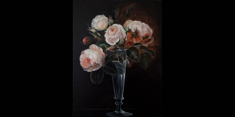 Lyseroede roser i glas