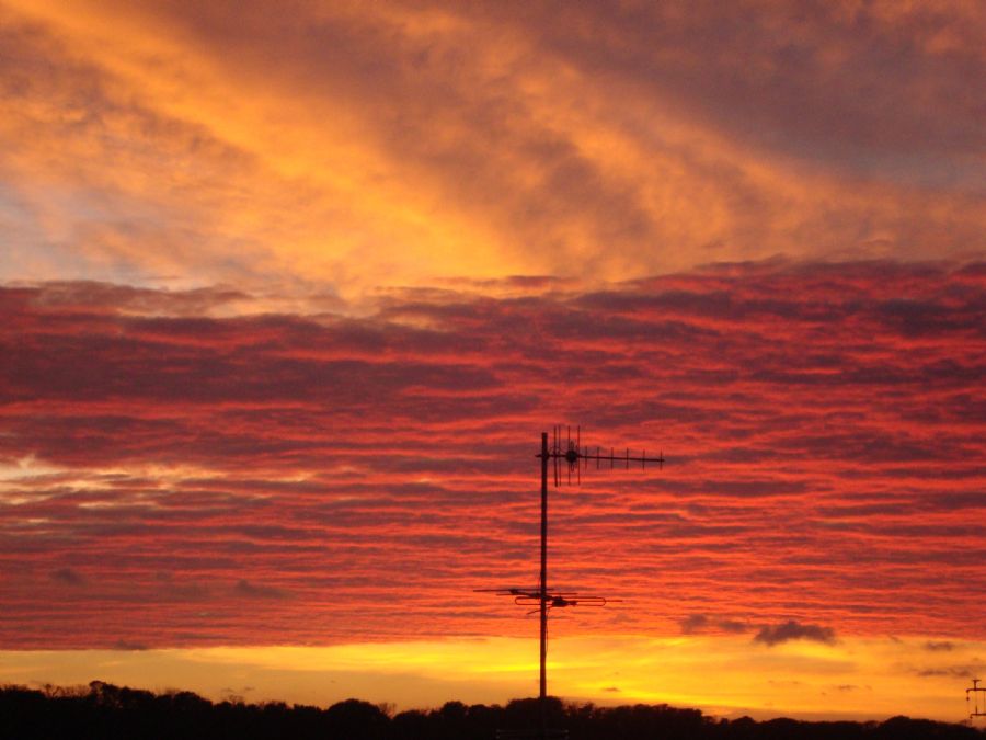 Solnedgang set fra mine vinduer mod nord