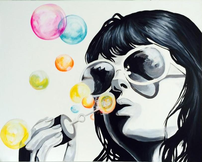 Blowing her dreams as bubbles