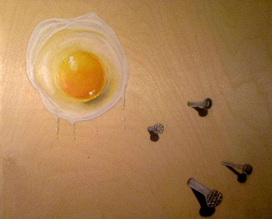 Egg on wooden wall