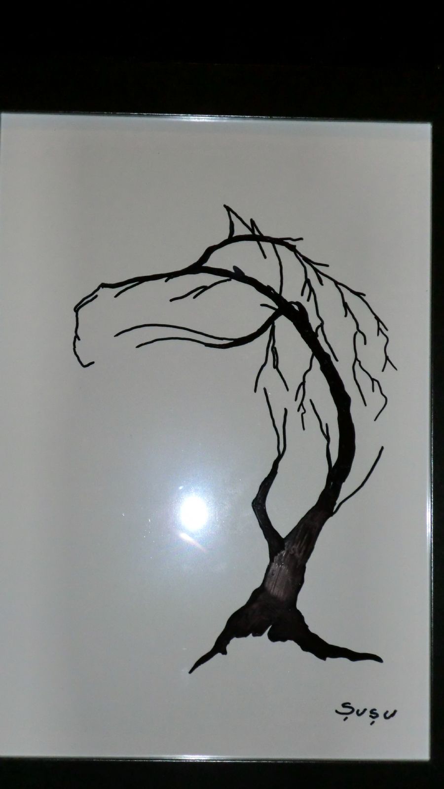En hest