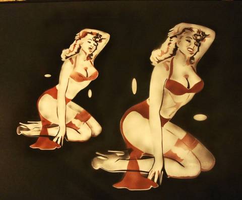 Two dolls red fabric